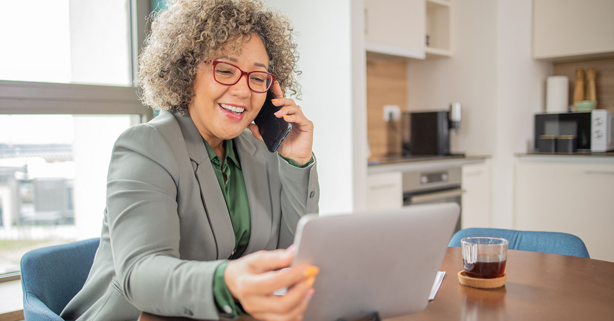 An agent closing a deal on her tablet